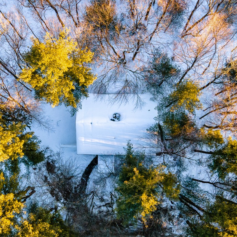 Cottage-from-above-in-winter