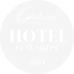 A white circle with the word HOTEL in bold, black, uppercase letters centered inside.