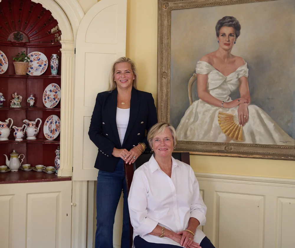 Two women and a picture portrait