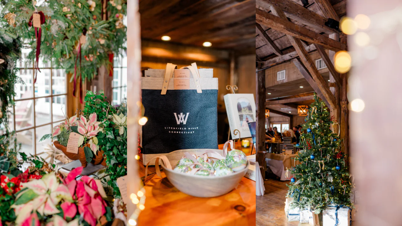 Holiday market with festive wreaths, a navy tote bag, candy in a bowl, and decorated Christmas trees in a rustic wooden interior with string lights.