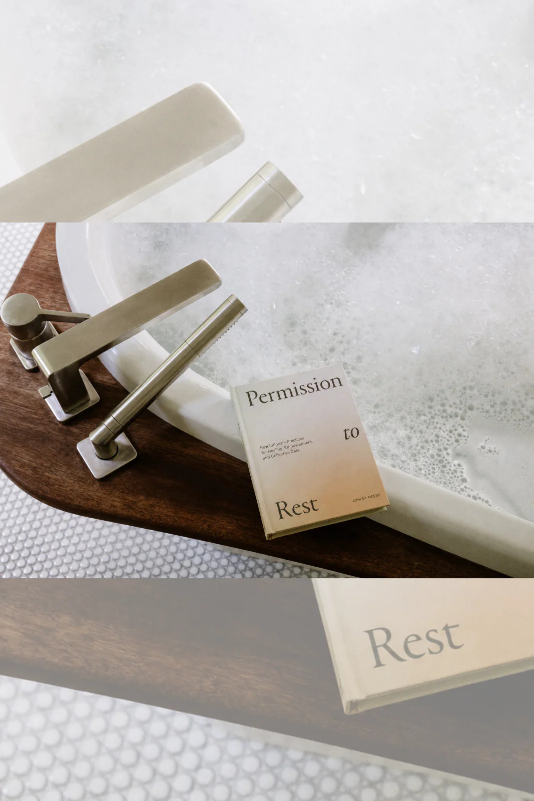 A bathtub with bubbles, a wooden tray, metal faucet, and a book titled Permission to Rest placed on the tray.
